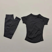 Set fitness donna 2 pezzi Histello – top attillato e leggings a costine seamless per yoga, palestra e allenamento - Campeda
