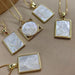 European and American Natural Shell Sacred Heart Angel Necklace